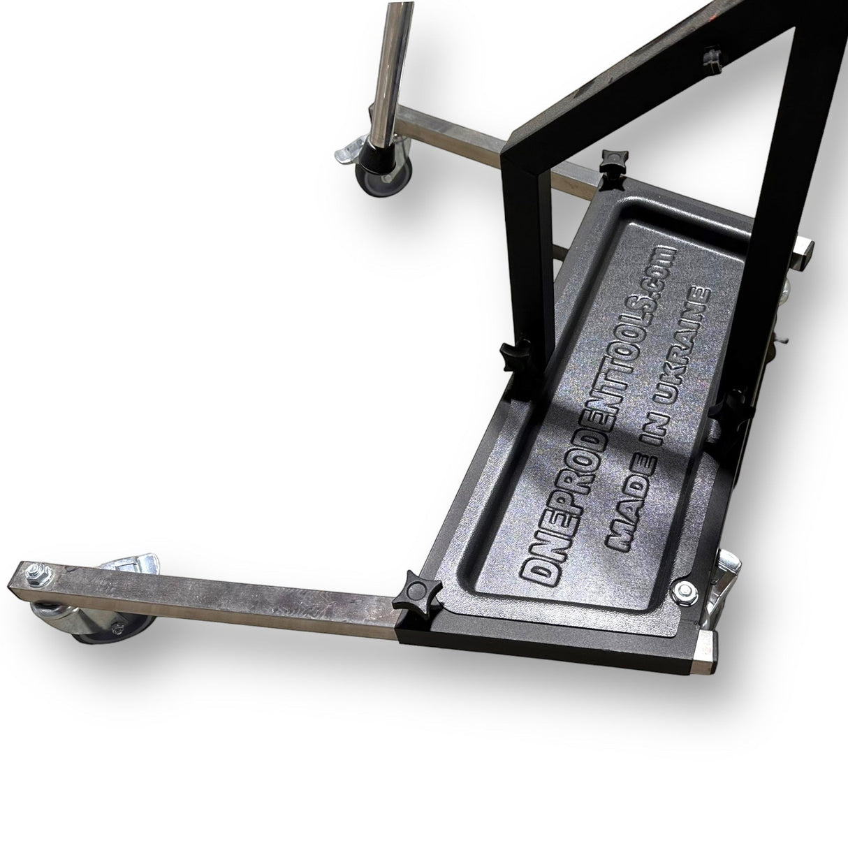Anson PDR DNE light stand with black metal frame and grey tray, featuring wheels for mobility.