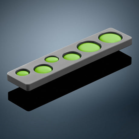 Anson PDR Glexo Diablo cold glue pads in a grey silicone mold with various green adhesive sizes for PDR hail repair