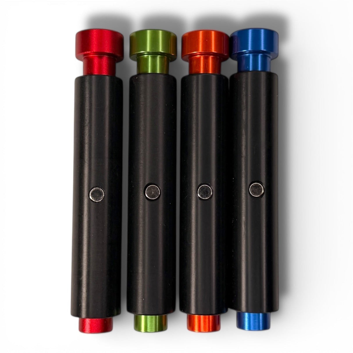 Anson PDR ShockBlocker X4 dent repair knockdowns in red, green, orange, and blue with black shafts and magnets.