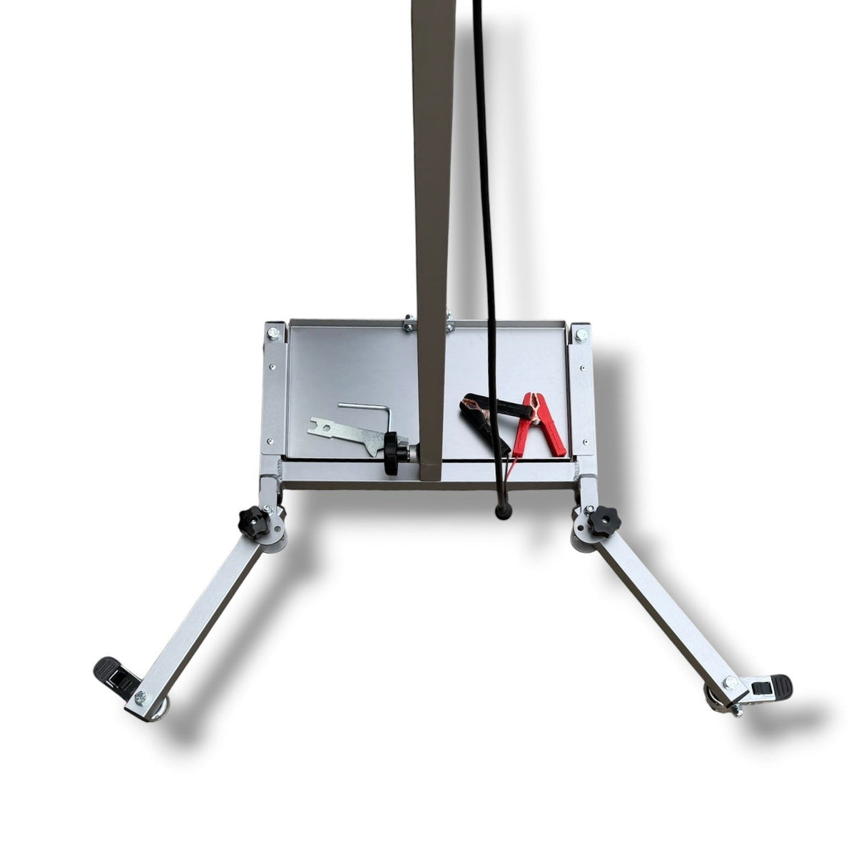 Anson PDR Econo Light Stand base with adjustable legs, battery tray, and cable clips. Silver aluminum construction.
