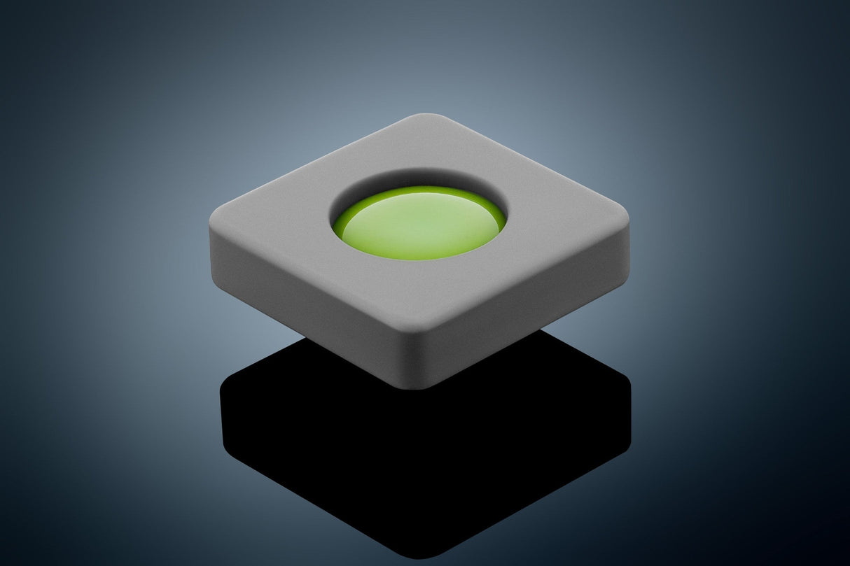 Anson PDR Glexo Diablo Cold Glue in a grey silicone mold with a bright green glue center. Professional PDR tool.
