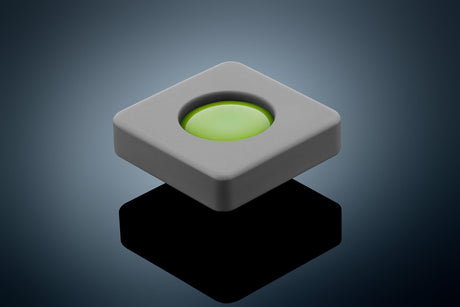 Anson PDR Glexo Diablo Cold Glue in a grey silicone mold with a bright green glue center. Professional PDR tool.