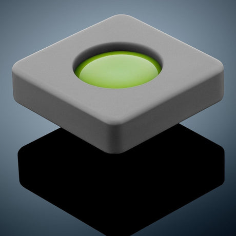 Anson PDR Glexo Diablo Cold Glue in a grey silicone mold with a bright green glue center. Professional PDR tool.